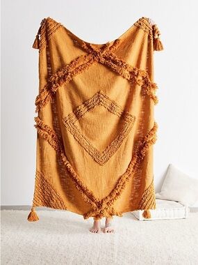 Urban Outfitters Aden Tufted Throw Blanket in Mustard